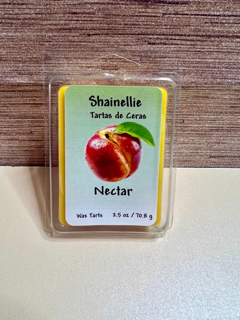 Nectar Red apple-shaped wax melt labeled "Shanella Nectar" with a green leaf design.